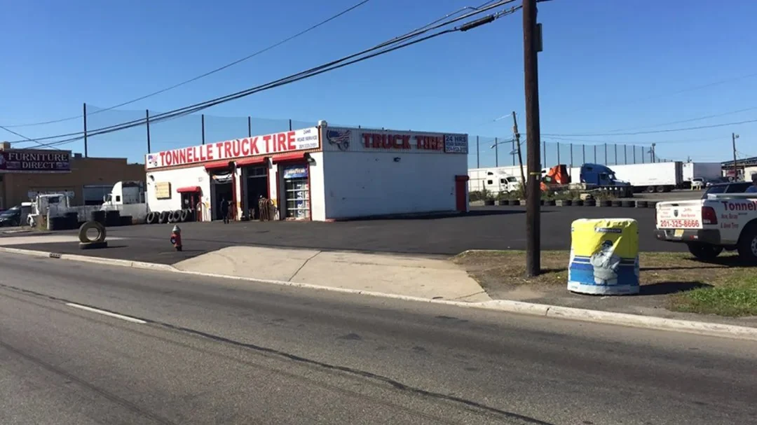 Tire service bay at Tonnelle Tire in Jersey City, NJ